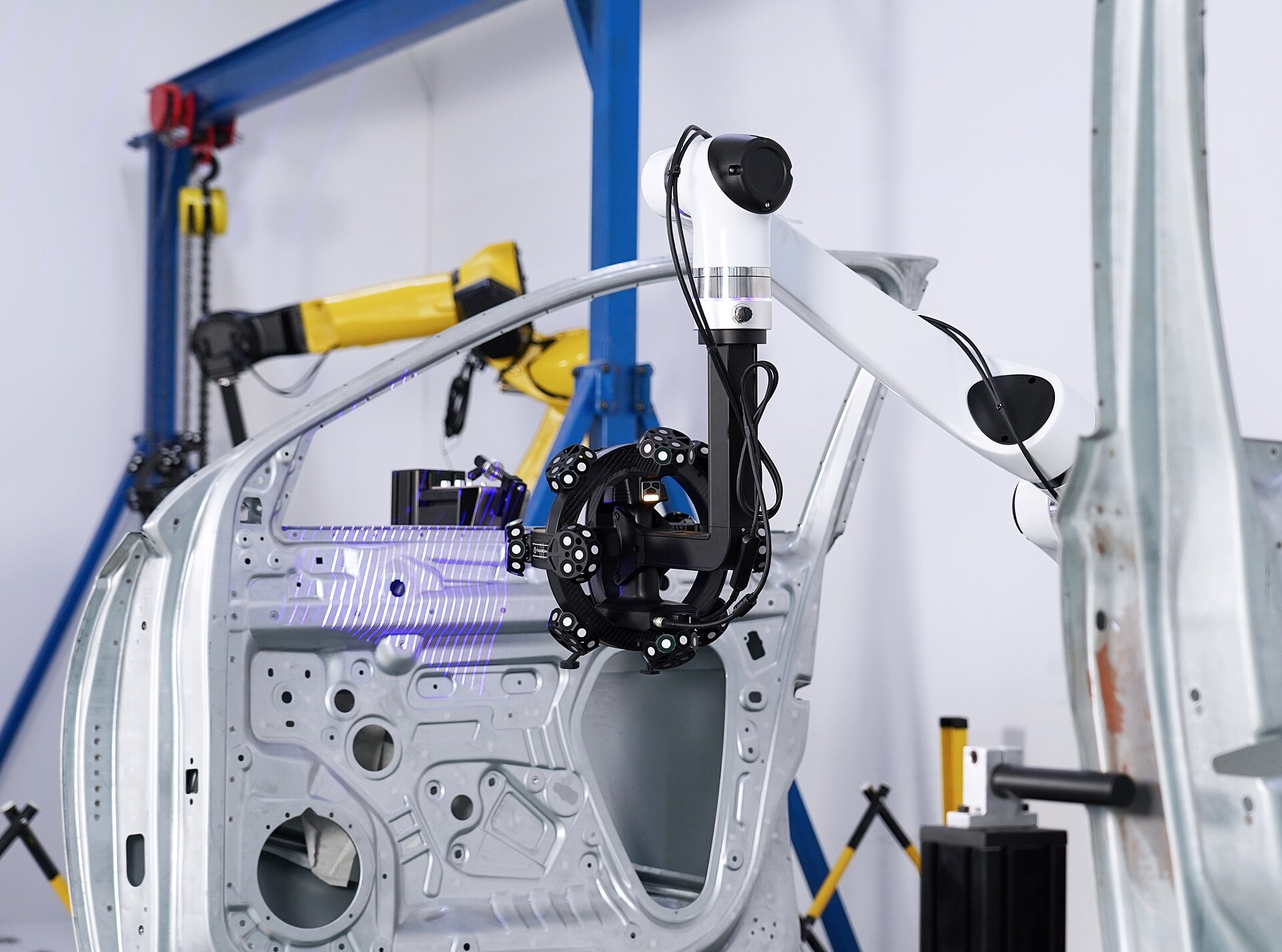3D scanner scanning a sheet-metal panel