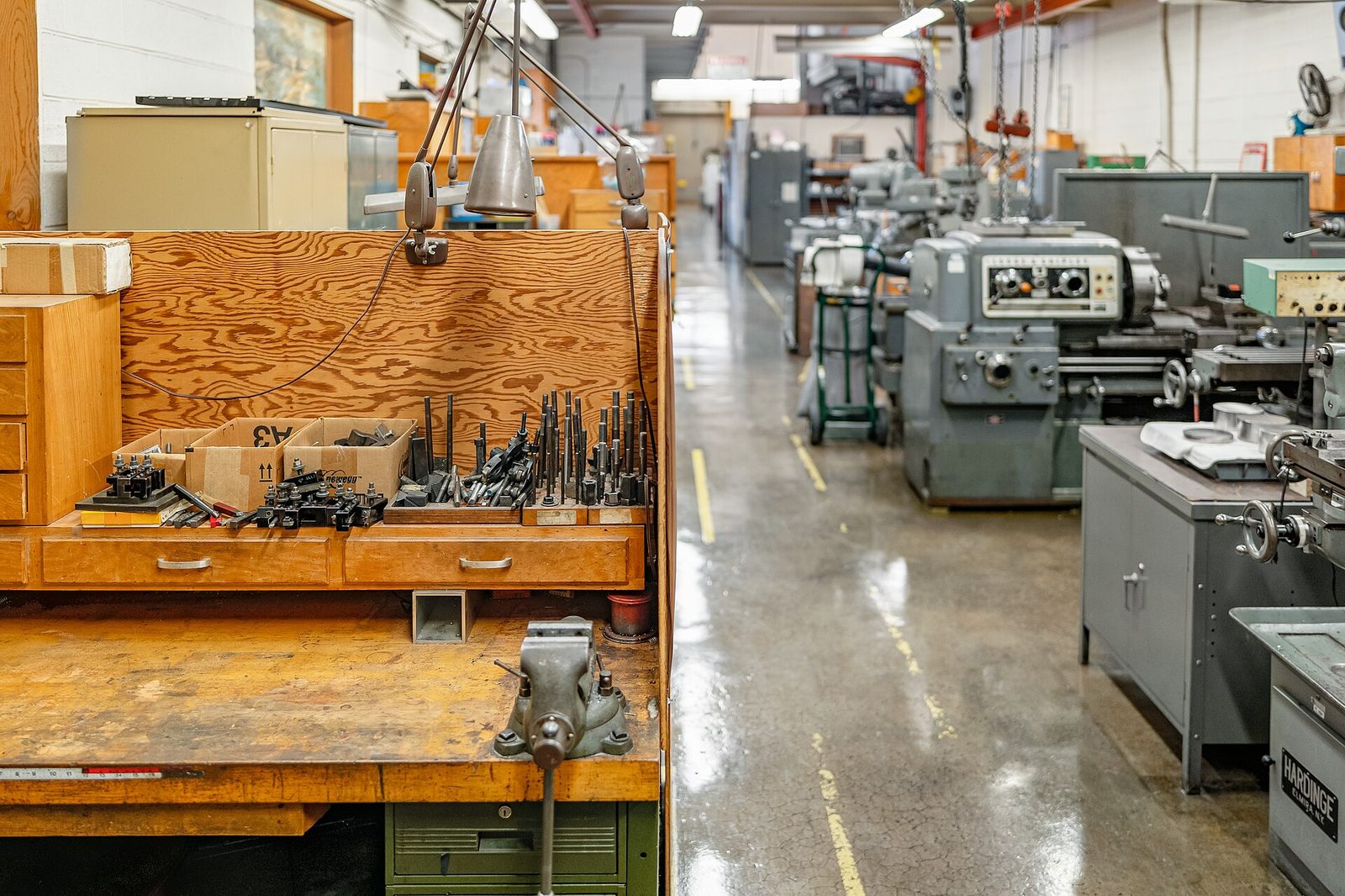 Toolroom bench with cutting tools and machines